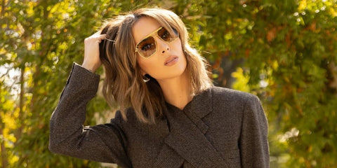 Model Brittny Button, also known as Brittny Ward, was seen wearing gold Bottega Veneta BV1012S 003 sunglasses with brown lenses in her Instagram post