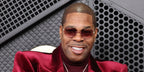 Busta Rhymes was seen wearing gold Cartier Panthere CT0549S 004 rimless sunglasses with red purple gradient lenses at the Grammy Awards 2026.