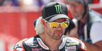 English motorcycle racer Cal Crutchlow was seen wearing matte white Oakley HSTN Sq OO9533 07 sunglasses with Prizm 24k Polarised lenses at the MotoGP of Italy, May 2026.