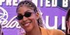 Basketball player Candace Parker was seen wearing black Miu Miu MU 04ZS 1AB5S0 oval sunglasses at the Sport Beach 2025.