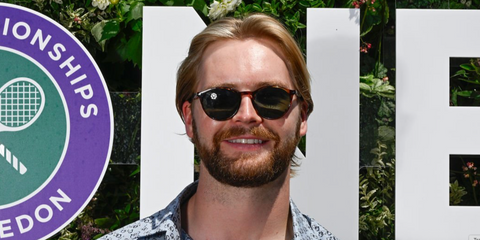 Irish goalkeeper Caoimhin Keller was seen wearing tortoiseshell Persol 3092SM 9015/31 round sunglasses with green lenses at the Wimbledon Tennis Championships 2026.