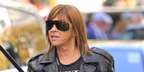 French fashion editor Carine Roitfeld was seen wearing Porsche Design 8479 B Titanium Wraparound Frame sunglasses at the Louis Vuitton Spring/Summer 2024 fashion show during Paris Fashion Week