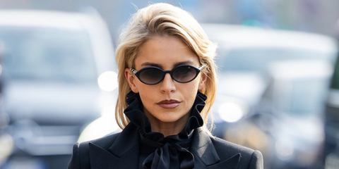 Caro Daur was seen wearing black Gucci GG2059S 001 round oval sunglasses with bamboo temples at the Gucci Fall/Winter 2026 fashion show during Milan Fashion Week.