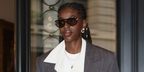 Singer-songwriter Cat Burns was seen wearing black Bottega Veneta BV1418S 001 sunglasses with yellow lenses at the Bottega Veneta Spring/Summer 2026 fashion show during Milan Fashion Week. Shop online now on Pretavoir