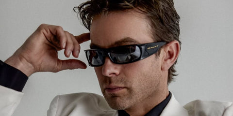 Chace Crawford was seen wearing black Oakley Highland OO9522 01  wrarparound sunglasses with Prizm black lenses in a Numero Netherlands feature, April 2026.