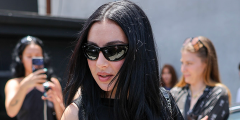 Charli XCX was seen wearing black Ray-Ban Mega Balorama RB 2289 901/31 sunglasses at her new album "Music, Fashion, Film" pop up in Los Angeles, July 2026.