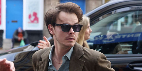 Charlie Heaton was seen wearing black Dita Monolix DTS 750 01 sunglasses with blue lenses in London, November 2025 while promoting Stranger Things season 5.