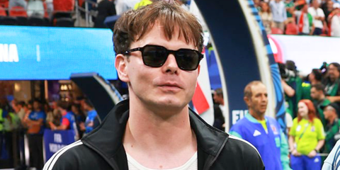 Charlie Heaton was seen wearing black Saint Laurent Sun SL 715 Slim 001 sunglasses at the World Cup 2026 semi final match between England and Argentina in Atlanta, Georgia.