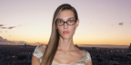 Canadian singer Charlotte Cardin was seen wearing tortoiseshell Miu Miu MU 01XV VAU1O1 oval optical glasses during Paris Fashion Week season Spring/Summer 2025
