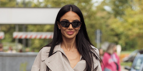 Italian fashion influencer Chiara Biasi was seen wearing black Prada PR A23S 1AB5S0 sunglasses at the Philosophy Spring/Summer 2025 fashion show during Milan Fashion Week.