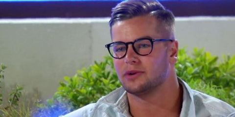 Chris Hughes was seen wearing black Tom Ford TF5891-B 005 Blue Control optical glasses in Love Island