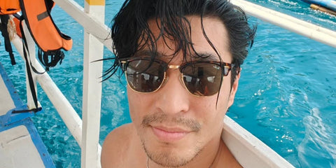 Australian actor Chris Pang was seen wearing tortoiseshell Ray-Ban Clubmaster Classic 3016 W0366 sunglasses in his Instagram post, July 2023.