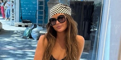 Chrissy Teigen was seen wearing black and gold Gucci GG1021S 002 oversized sunglasses in her Instagram post, August 2025.