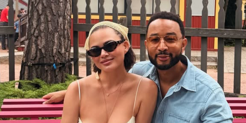 Chrissy Teigen was seen wearing tortoise Prada PR 26ZS 14L09Z cat-eye sunglasses in Finland, shared through her Instagram post in July 2026.