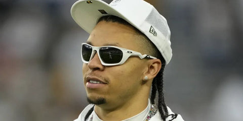 American football player Christian Watson of Green Bay Packers was seen wearing white Oakley Lateralis OO9431 10 Prizm Polarised sunglasses