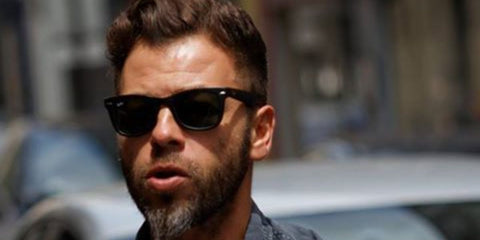 French singer-songwriter Christophe Mae was seen wearing the iconic Ray-Ban Wayfarer 2140 901 Black sunglasses. Shop online now on Pretavoir