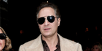 Italian actor Claudio Santamaria was seen wearing gold and silver Dolce&Gabbana DG2288 1313/87 aviator sunglasses at the Dolce & Gabbana Menswear Fall/Winter 2026 fashion show duringMilan Men's Fashion Week.