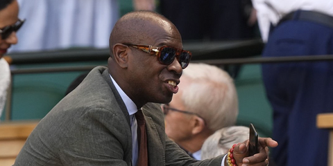 British journalist and presenter Clive Myrie was seen wearing brown Persol Vincent 3373S 96/56 sunglasses with blue lenses at the Wimbledon Tennis Championships 2025. Shop online now on Pretavoir