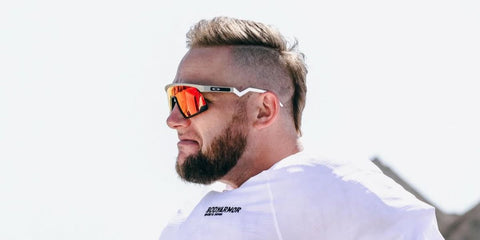 YouTuber Cody Jones of Dude Perfect was seen wearing white Oakley BXTR OO9280 04 Prizm sunglasses in his Instagram post, August 2025.