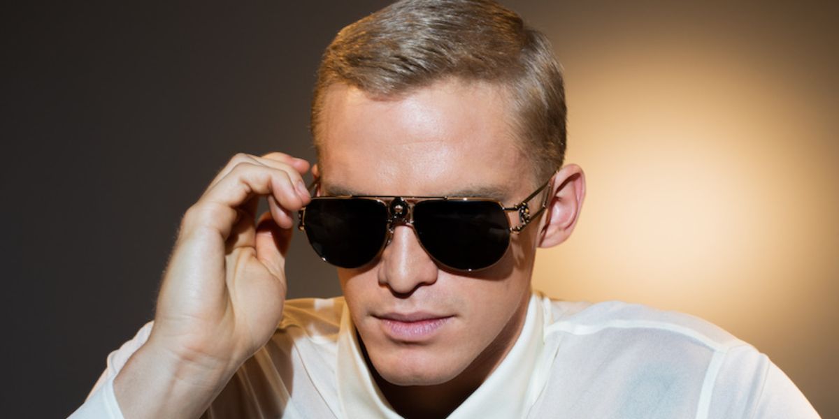 Australian singer and swimmer Cody Simpson was seen modeling gold Versace 2225 1002/87 sunglasses in the Versace Eyewear campaign
