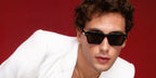 Cooper Koch was seen wearing black Oliver Peoples Errisson Sun OV5562SU 1731/P2 Polarised sunglasses in a fashion editorial page of Paper Magazine, December 2024