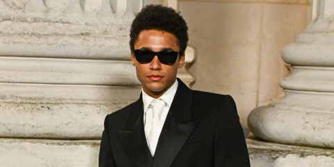 Canadian actor Corteon Moore was seen wearing black Saint Laurent Sun SL 613 001 sunglasses at the Saint Laurent Menswear Fall/Winter 2025 fashion show during Paris Men's Fashion Week.