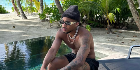 DDG was seen wearing black Balenciaga BB0096S 001 sunglasses during his vacation in Bora Bora, November 2023