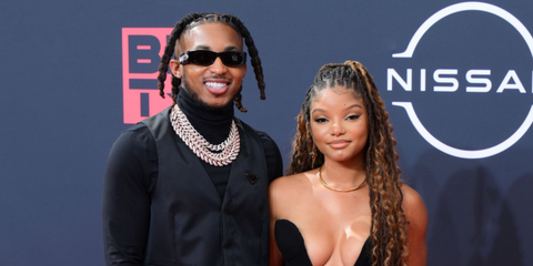 DDG, pictured with Halle Bailey, was seen wearing black Palm Angels Angel PERI007 1007 sunglasses at the 2022 BET Awards
