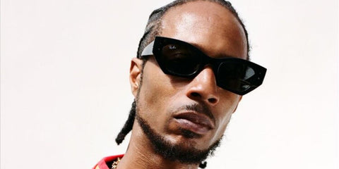 DJ and record producer D Double E was seen wearing black Ray-Ban Zena RB 4430 6677/87 sunglasses.