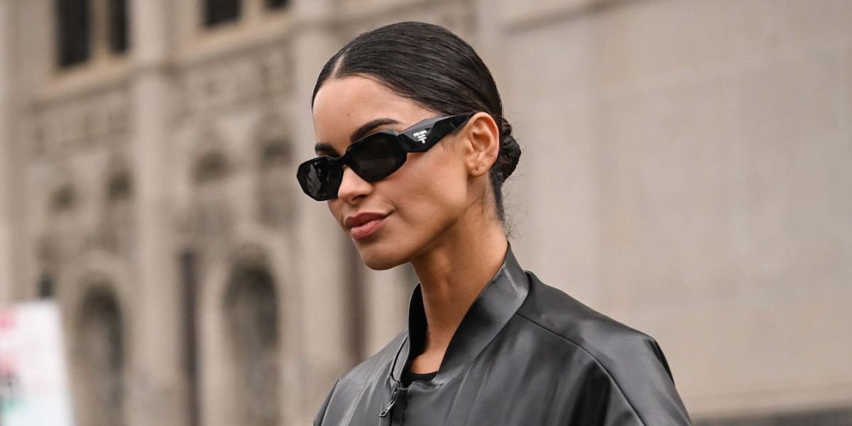 Brazilian model Daiane Sodre was seen wearing black Prada PR 17WS 1AB5S0 Symbole Sunglasses during New York Fashion Week Fall/Winter 2026 season.