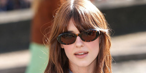 Celebrity actress Daisy Edgar-Jones was seen wearing new Miu Miu MU B09S 14L20V round oval sunglasses in tortoiseshell with brown lenses at the Miu Miu Fall/Winter 2026 show during Paris Fashion Week.