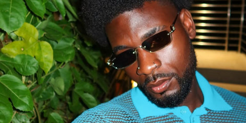 Television personality Dami Hope of Love Island (2022) was seen wearing Gucci GG1278S 001  rectangular sunglasses with brown lenses in his Instagram post, July 2025.