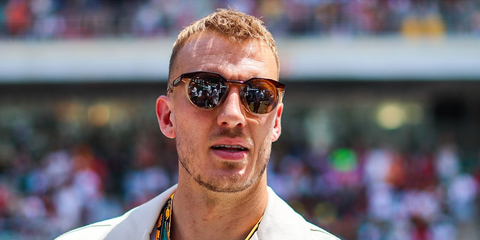 Dan Burn was seen wearing two-tone brown and transparent beige Oakley HSTN OO9242 07 Prizm sunglasses at the 2025 F1 Grand Prix of Spain