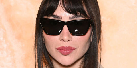 Singer Dana Hourani was seen wearing black Saint Laurent SL M103 005 sunglasses at the Saint Laurent Fall/Winter 2025 fashion show during Paris Fashion Week.