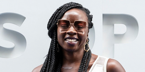 Actress Danai Gurira was seen wearing gold Burberry Daphne BE3133 1337/13 oversized square sunglasses with pink-brown gradient lenses at the US Open 2026.