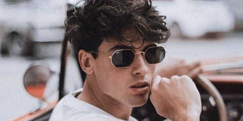 Spanish model and creator Daniel Illescas was seen wearing gold Ray-Ban Octagonal RB 3556N 001 sunglasses