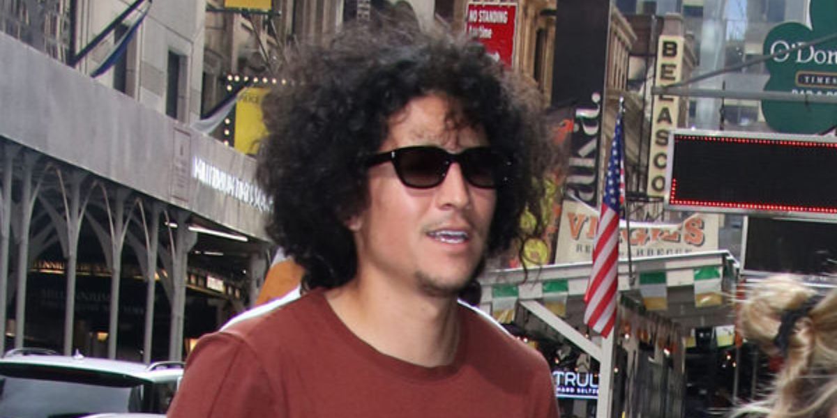Danny Ramirez was seen wearing black Saint Laurent Sun SL 522 001 sunglasses with grey gradient lenses in New York City