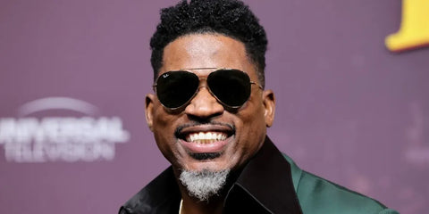 Rapper David Banner was seen wearing gold Ray-Ban Aviator Reverse RB R0101S 001/VR sunglasses.