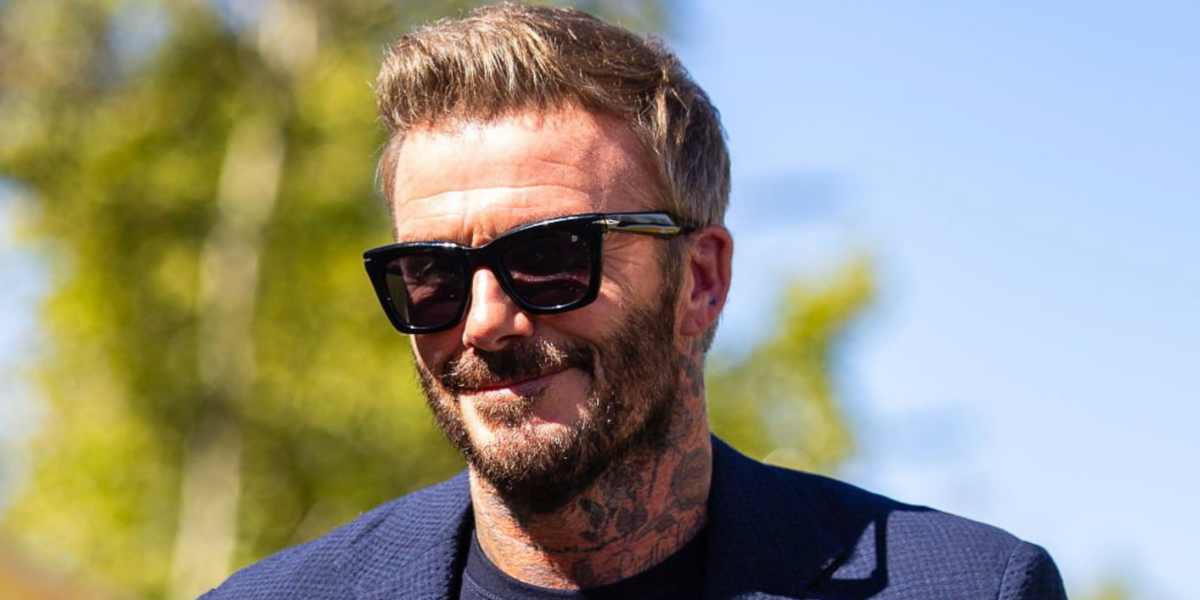 David Beckham wore black David Beckham Eyewear DB 99/MIAMI 807/KE sunglasses with pink Photochromic lenses at the F1 Spanish Grand Prix 2026