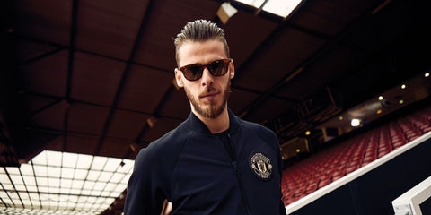 Spanish footballer David de Gea of Manchester United was seen wearing striped brown Maui Jim Koko Head H737 10M sunglasses.