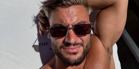 Television personality Davide Sanclimenti of Love Island was seen wearing Gucci GG1495S 001 sunglasses in his Instagram post, July 2024.