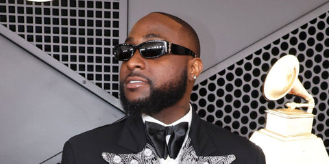 Nigerian-American singer Davido was seen wearing black Saint Laurent Sun SL M152 001 sunglasses at the Grammy Awards 2026.