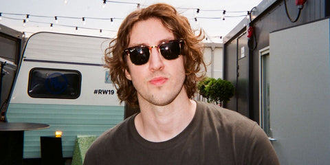 Australian singer Dean Lewis was seen wearing tortoiseshell Ray-Ban Clubmaster RB 3016 990/58 Polarised sunglasses in an ENFNTS TERRIBLES feature, July 2019.
