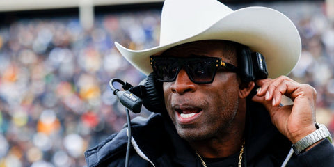 Coach and former athlete Deion Sanders is seen wearing Balmain B-V BPS-121A sunglasses