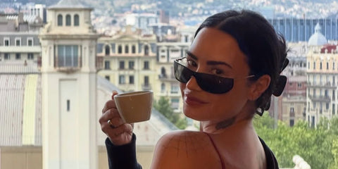 Demi Lovato was seen wearing black and silver Saint Laurent Sun SL 807 001 sunglasses in Barcelona, shared through her Instagram post in June 2026.