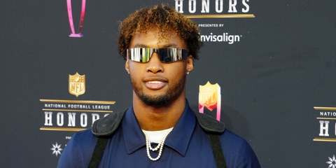 American football player Denzel Ward of the Cleveland Browns was seen wearing silver Balenciaga BB0041S 002 shield sunglasses at the 11th Annual NFL Honors in Inglewood, California, February 2022.