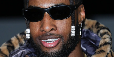 American football player Denzel Ward of the Cleveland Browns was seen wearing matte black Ray-Ban Daddy-O RB 2016 W2578 sunglasses during Paris Men's Fashion Week Fsll/Winter 2026.