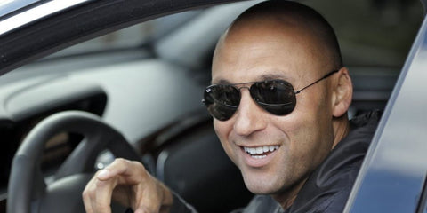 Derek Jeter was seen wearing black Ray-Ban Aviator RB 3025 L2823 Black/Green sunglasses