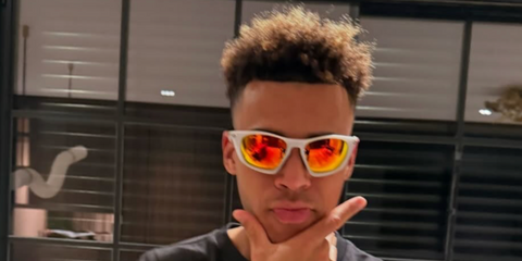 French footballer Desire Doue was seen wearing white Oakley Lateralis OO9431 10 sunglasses with Prizm road Polarised lenses