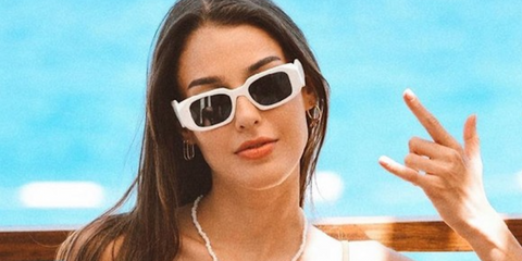 Turkish actress Dilan Cicek Deniz was seen wearing white Prada PR 17WS 1425S0 sunglasses.